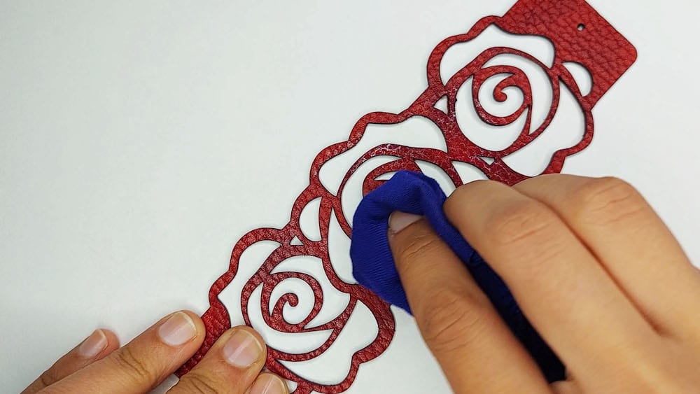 Step 3b: Apply the sheen to the leather with the rag lightly Step 3b: I apply the sheen to the leather with the rag lightly.