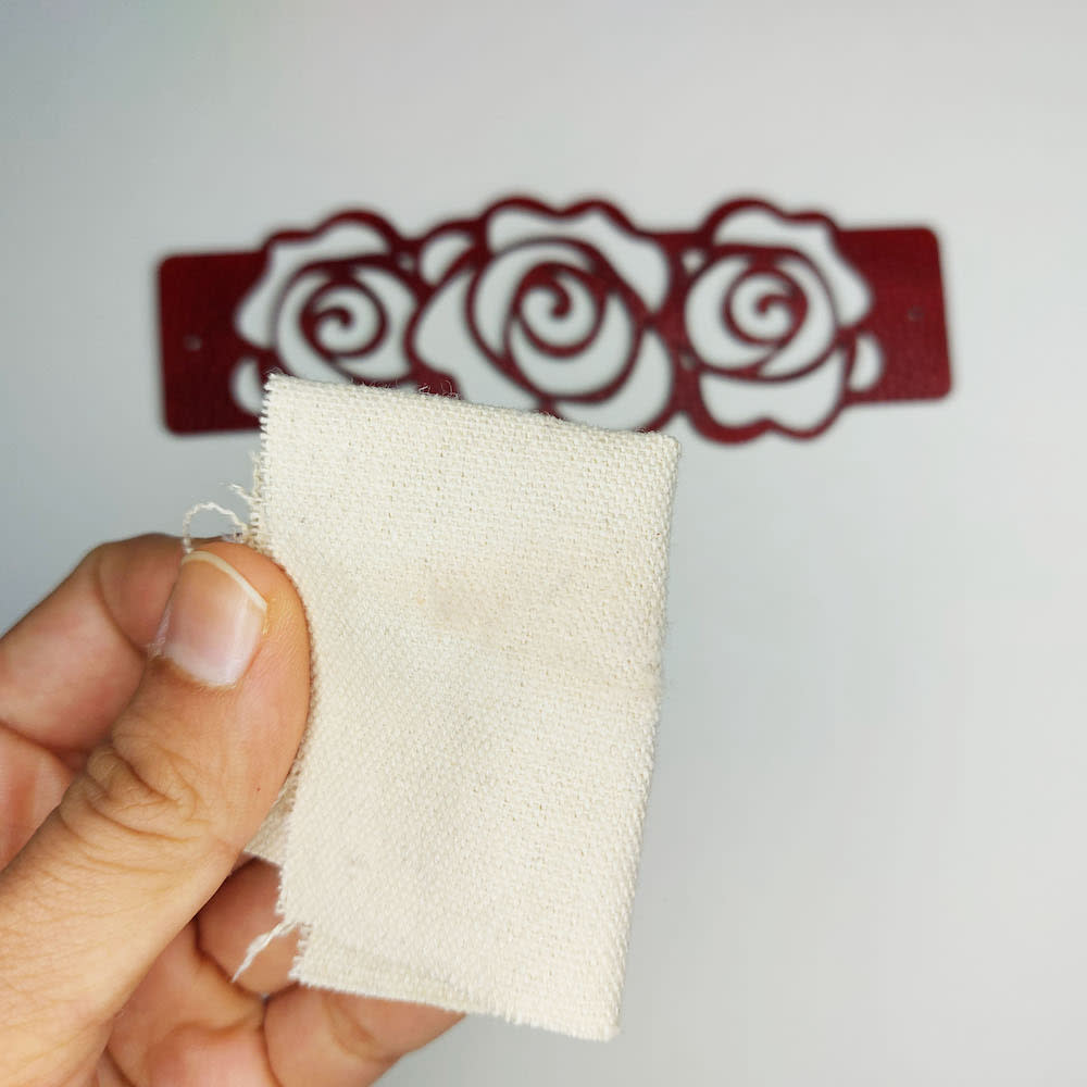 Step 3g: The rag should have very little rub-off Shows the canvas rag with very little rub-off.