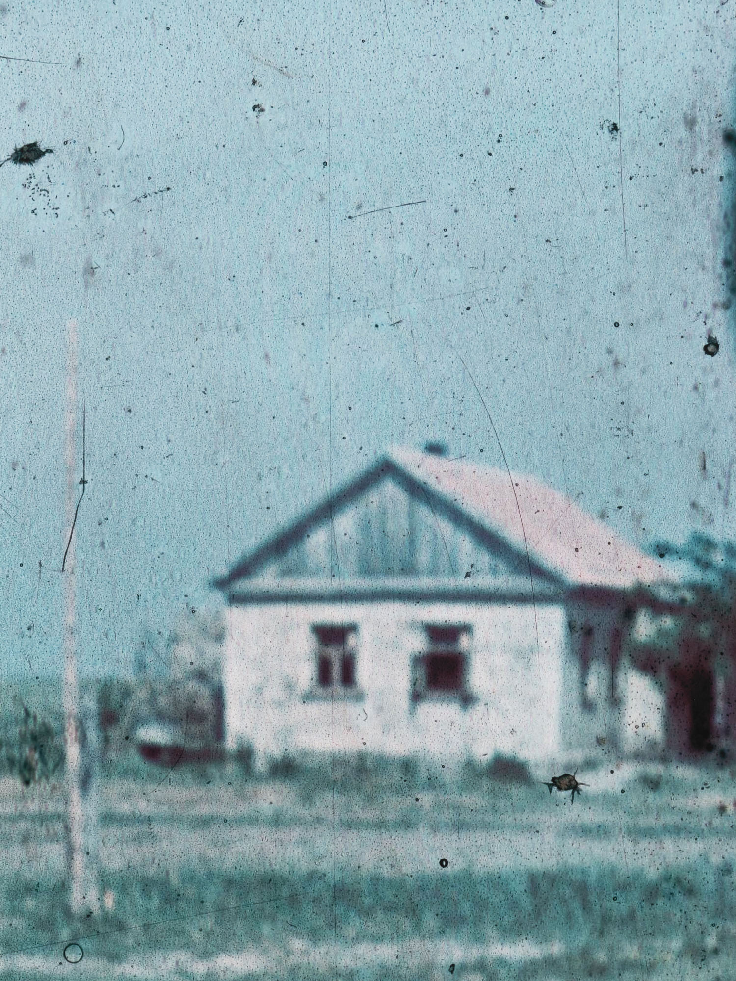 Enlarged detail from an Agfacolor photograph by Horst Grund, 1941. Architectural elements become abstract forms through cropping, while material traces create new aesthetic layers of meaning.