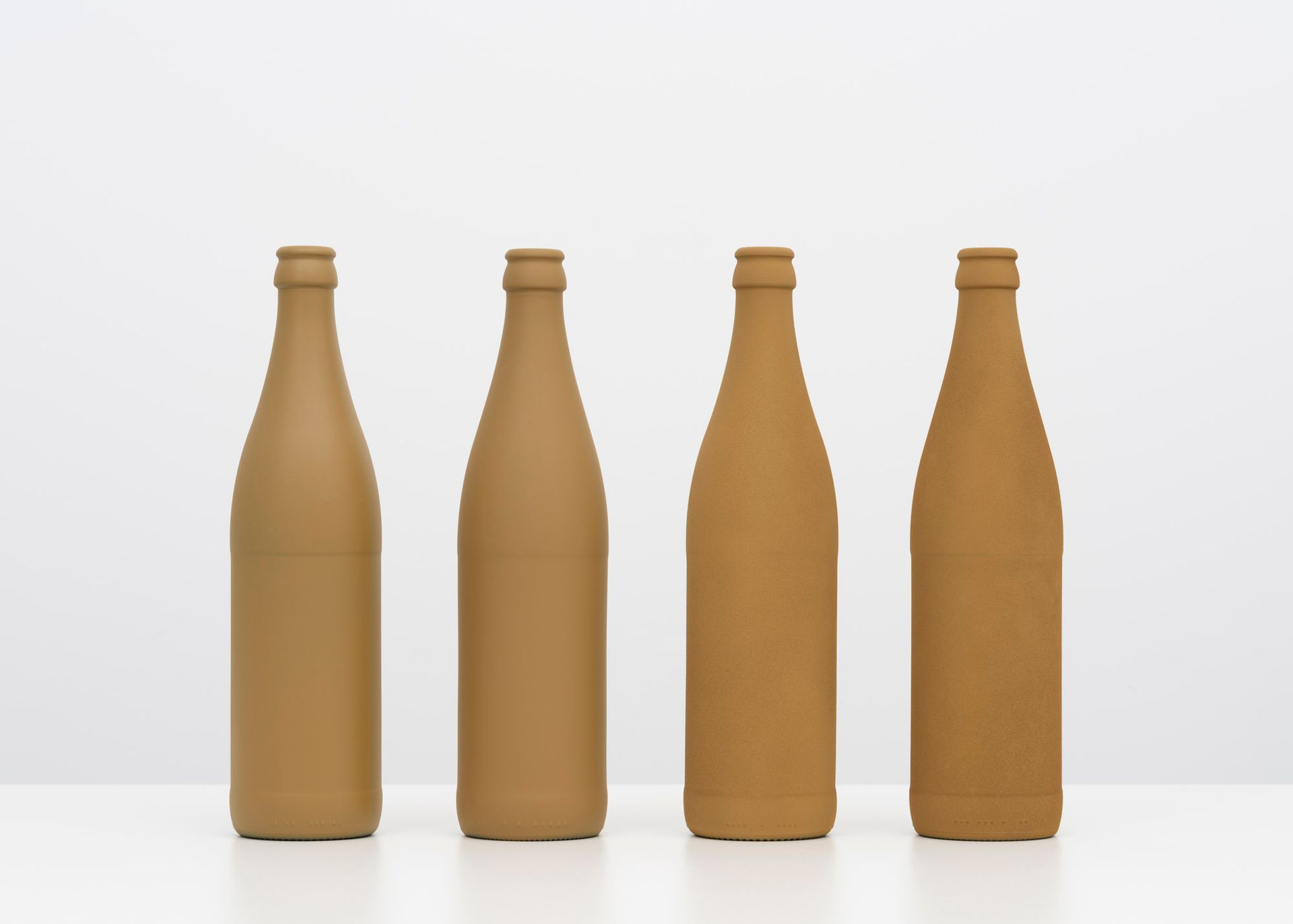 Four Bottles in Vichy-shape (Yellow Brown), 2021. Pigment print, 42 x 59 / 59 x 84 / 84 x 119 cm. From the series DIN.