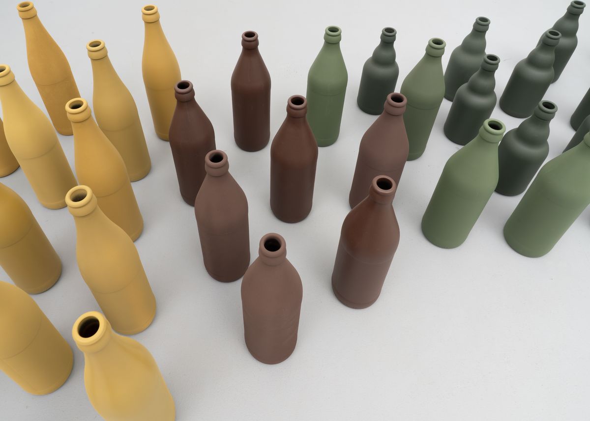 The pack (das Rudel), 2023. Paint on glass bottles, 170 × 75 × 26 cm (dimensions variable). From the series DIN – Standard parts in RAL colors. - Detail 2