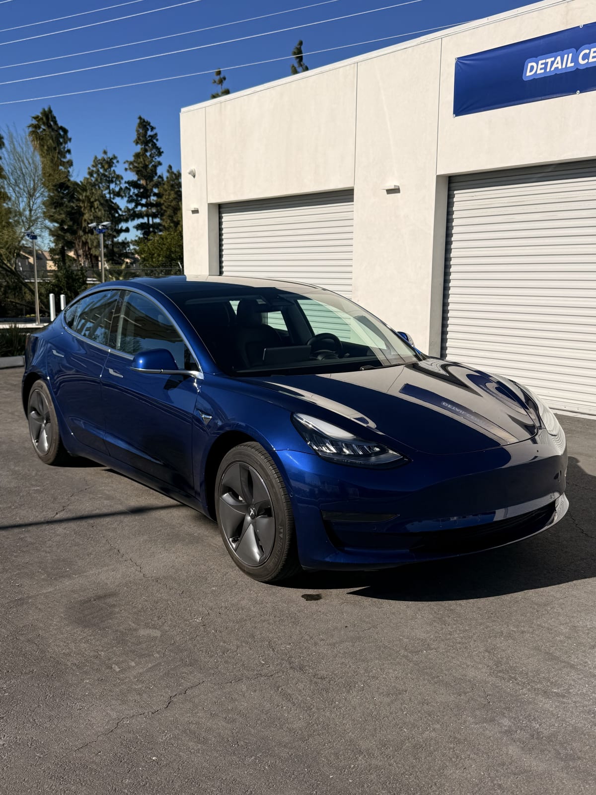 Blue Tesla at CDA Auto Styling after paint-protection service