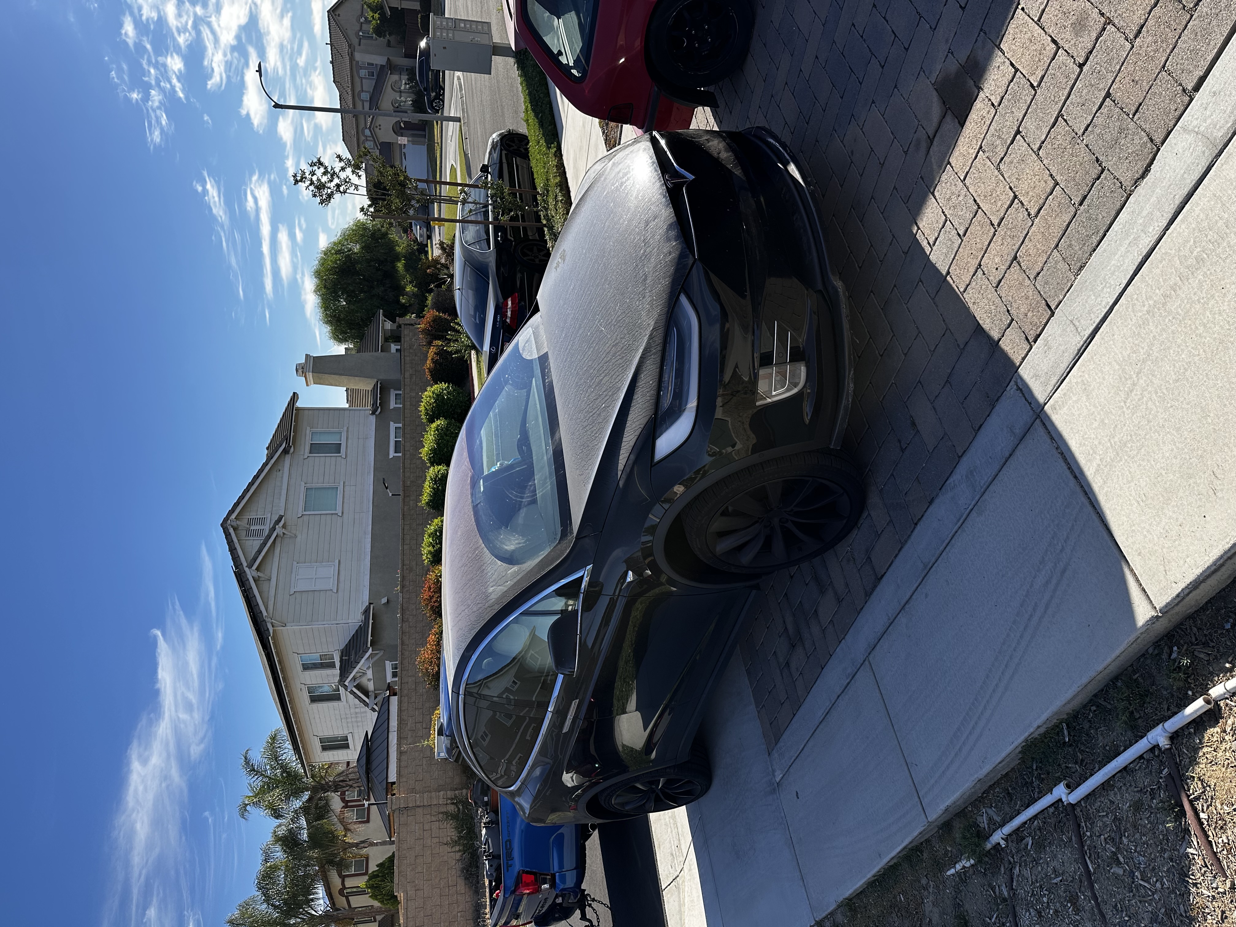Before mobile detailing service by CDA Auto Styling on a Tesla Model X