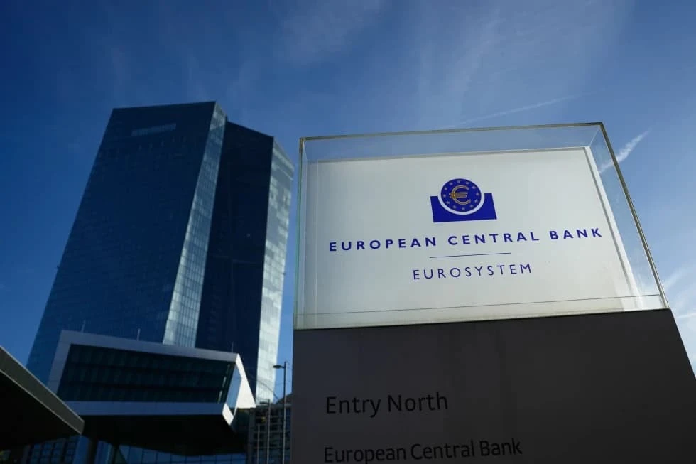 European Central Bank headquarters sign and tower in Frankfurt Germany under clear blue skies