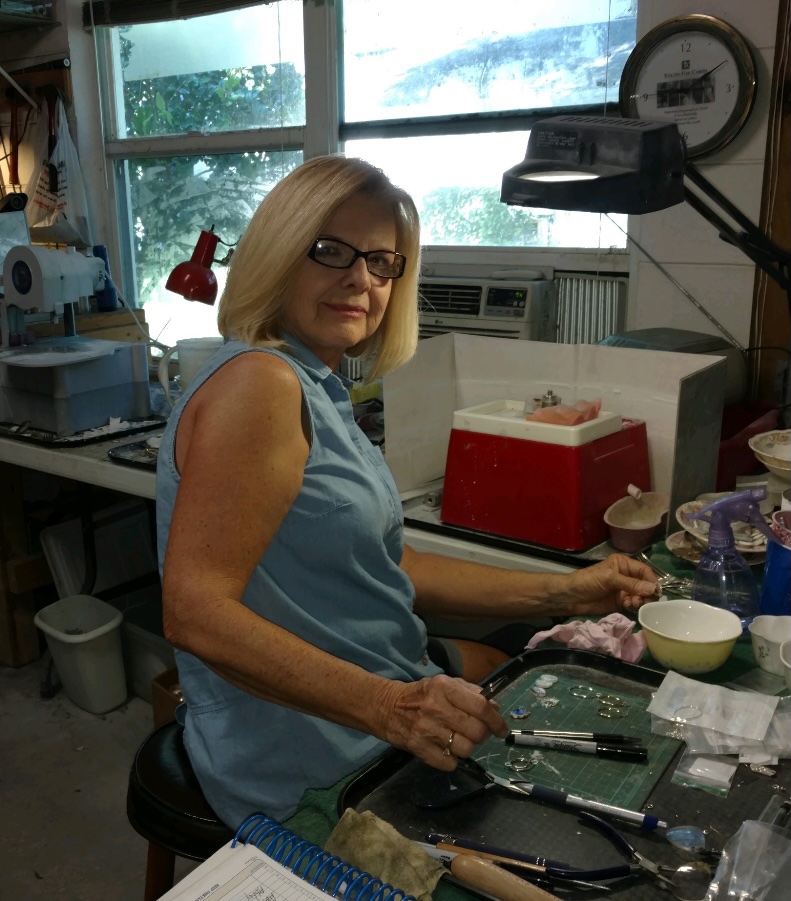 Tina Goolsby in her jewelry workshop