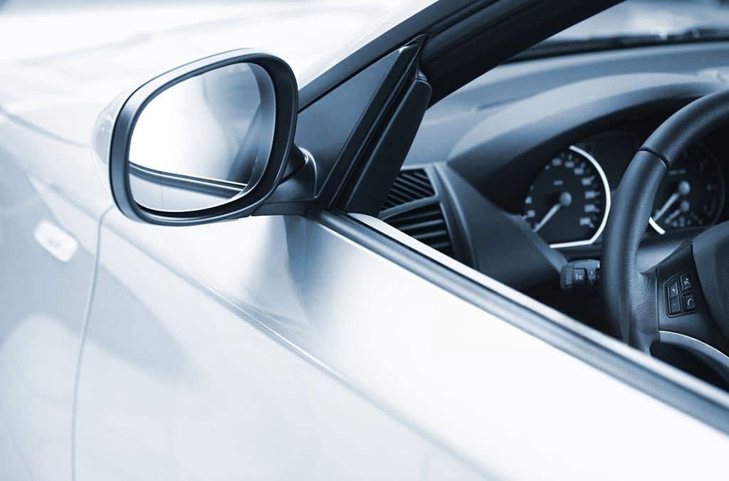 side view of a luxus car. nice sharpness in the mirror