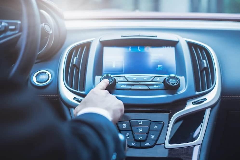 Technician checking car functions