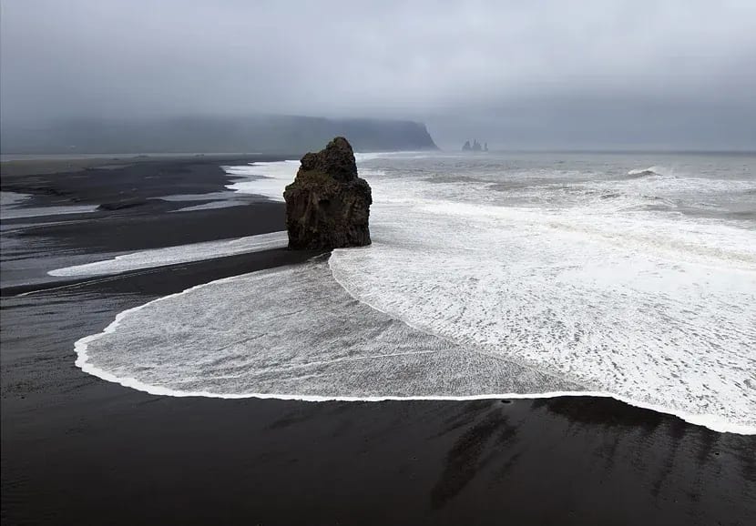 Reynisfjara black sand beach during a foggy day