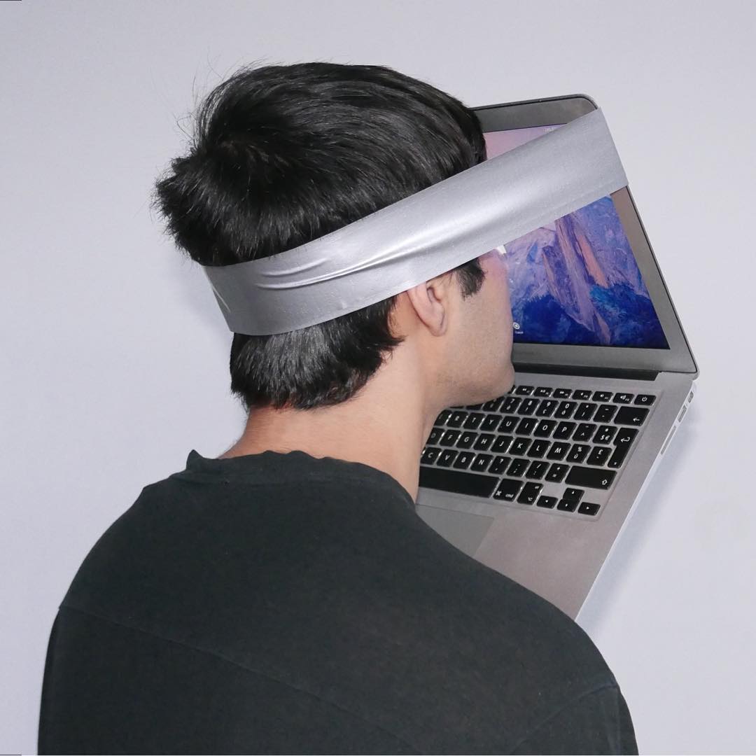 Laptop Face - Man with laptop bound to face
