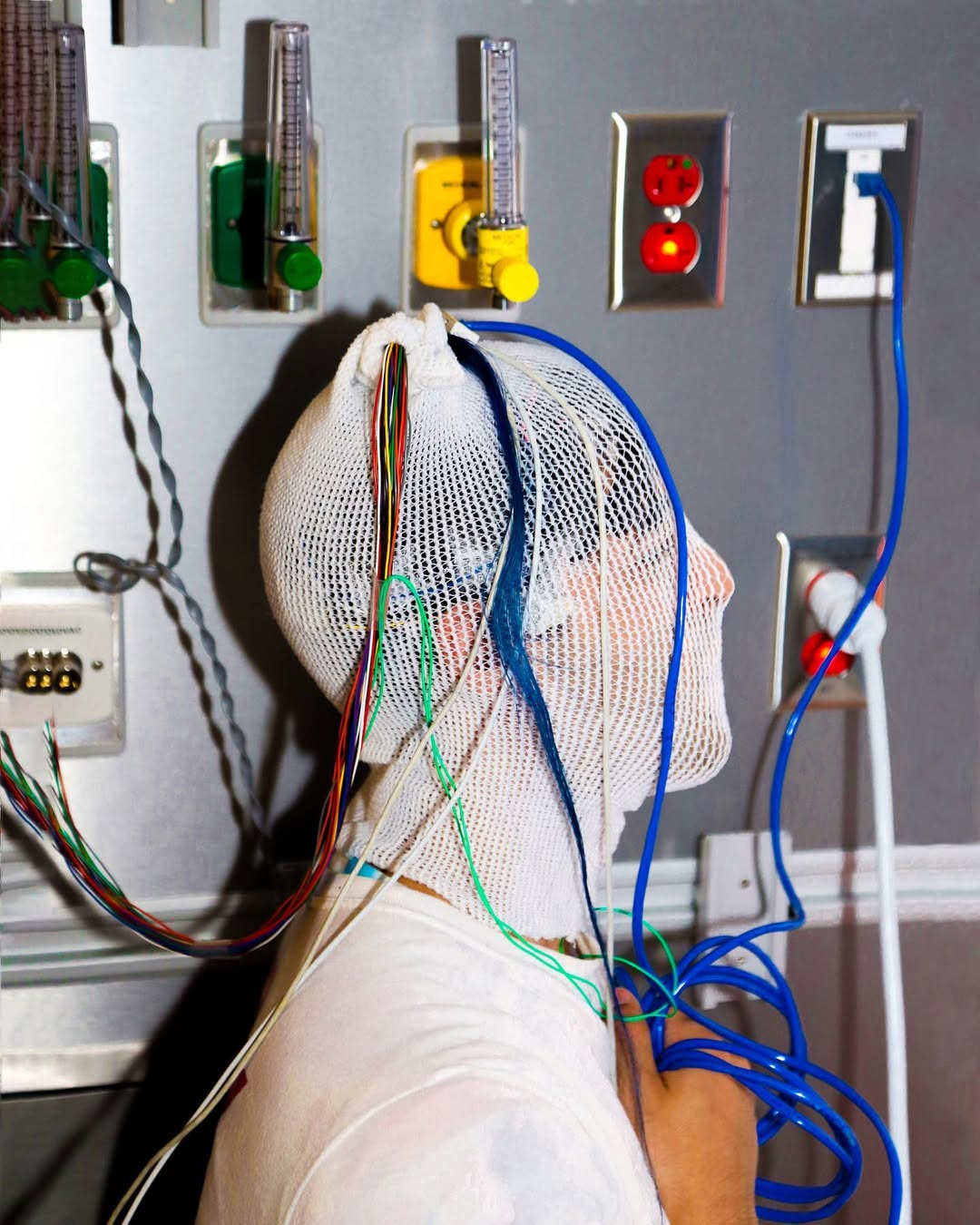 Neural Wealth - Artist connected to EEG machine
