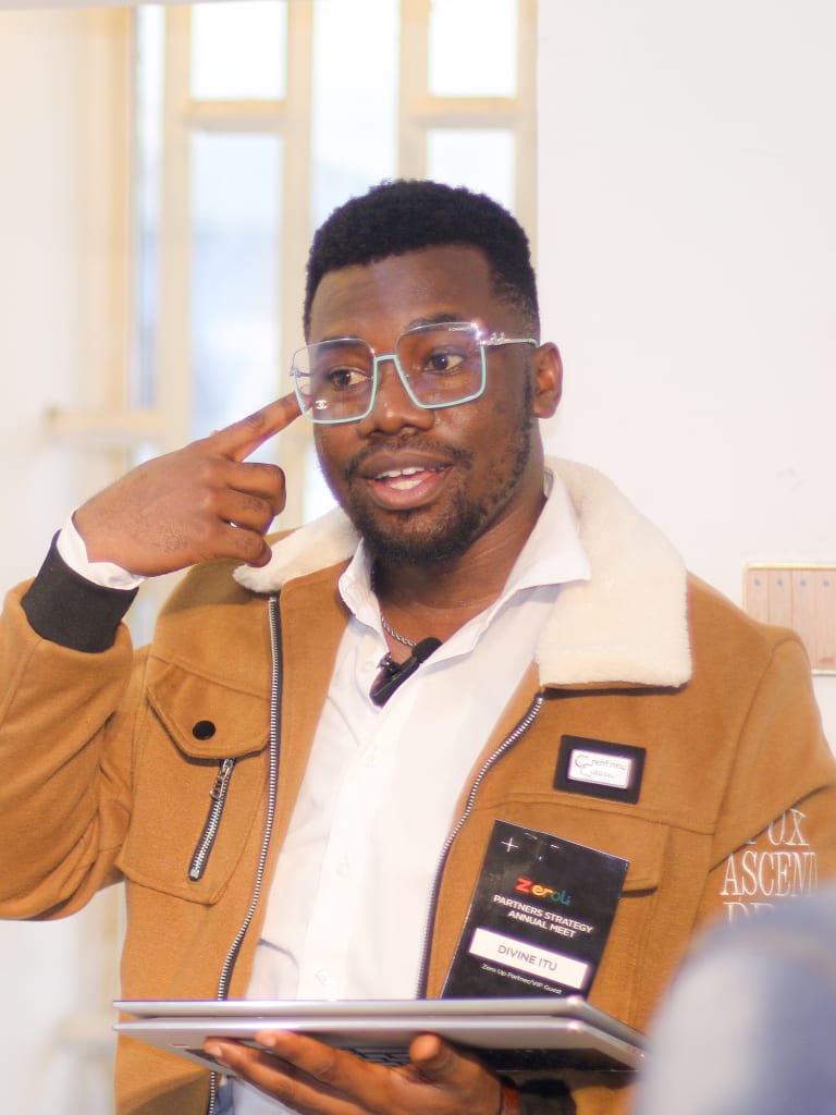 Divine is a software engineer, product builder, and technology leader working at the intersection of Africa's data, media, and AI futures. He studies software engineering at the African Leadership University in Kigali, Rwanda. He has spent the last several years building a portfolio of interconnected ventures that each tackle a different piece of the same question: how does the next generation of African infrastructure get built, and who gets to build it? He serves as Project Manager at the Pan-African Centre for Social Development and Accountability (PACSDA), where he leads the African Youth Observatory (AYO) — a continental intelligence platform consolidating youth development data across all 54 African countries and 9 thematic areas, from education and employment to health, governance, and digital access. Under his leadership, AYO has grown into a full-stack data product with a live World Bank data pipeline, a proprietary Youth Index engine, and an AI-powered insights layer built on top of 60+ endpoints — turning raw continental datasets into actionable intelligence for policymakers, researchers, development partners, and young Africans themselves. Alongside PACSDA, he serves as Chief Marketing Officer of AfriZoneMart Distribution — a pan-African commerce platform operating under the banner Made in Africa, delivered worldwide. At AfriZoneMart he authored the company's full CMO operations playbook and brand identity system, bridging the rare gap between marketing strategy and technical execution. Divine is also Co-Founder of ZeroUp Initiative, Head of Technology and Innovations at ZeroUp Next, and Co-Founder of BridgeAI. He is also building Lasante Foods, where he developed, branded, and brought to market the company's debut product — a crayfish seasoning — handling everything from formulation to packaging to distribution. That same instinct for end-to-end ownership powers It's Made In Africa, his documentary series profiling African producers and the processes behind the goods the continent makes but rarely celebrates. Divine leads media technology for SLICNations, the digital media arm of Spirit Life International Church, where he is building an ambitious ecosystem of AI-powered broadcast and production tools. His work is defined by three things: shipping — turning strategy documents into working systems; integration — designing every project to eventually speak to every other; and African agency — the conviction that the continent's most important platforms should be built by, for, and from within it. He lives and works between Lagos, Nigeria and Kigali, Rwanda.