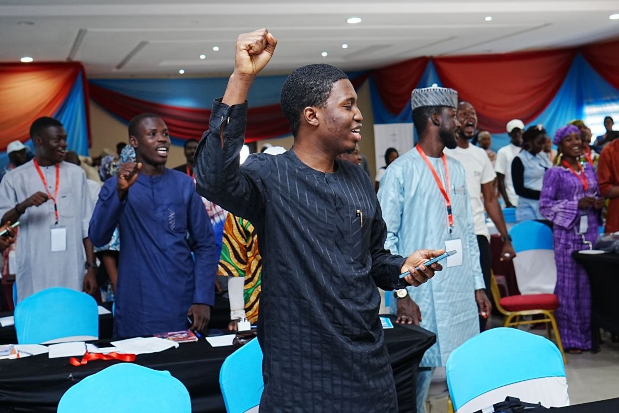 Young Nigerians rallying together during a PACSDA-supported youth empowerment session