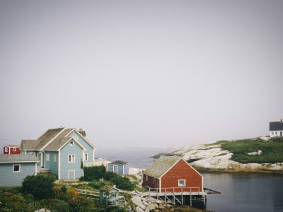 Colourful fishing village houses on granite rocks, Peggy's Cove, Nova Scotia