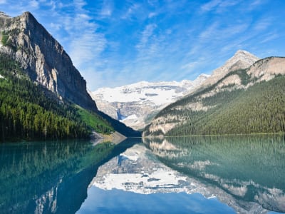 Lake Louise with perfect mountain reflection on calm turquoise water, Banff National Park