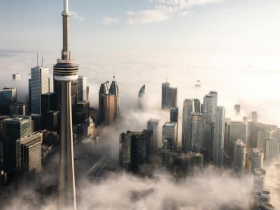 Toronto skyline with CN Tower rising above clouds, Ontario, Canada