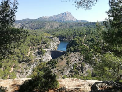 Montagne Sainte-Victoire rocky limestone peak above a reservoir near Aix-en-Provence, immortalized by Cézanne, France