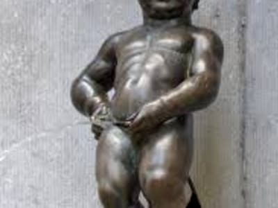 The Manneken Pis bronze fountain statue, iconic landmark and symbol of Brussels, Belgium