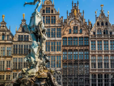 Baroque Brabo fountain and ornate guild houses on the Grote Markt square in Antwerp, Belgium