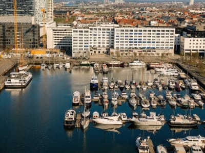 Marina with sailing boats and yachts along the Antwerp waterfront on the river Scheldt, Belgium
