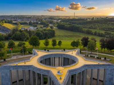 Aerial view of the star-shaped Mardasson Memorial at sunset in Bastogne, commemorating the Battle of the Bulge, Belgium