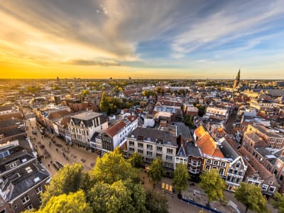 Aerial view of Groningen city with canals and historic centre bathed in golden sunset light, Netherlands
