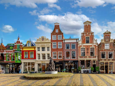 Colourful historic guild house facades on the Waagplein cheese market square in Alkmaar, Netherlands