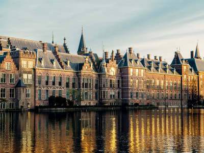 Panoramic view of the historic Binnenhof parliament complex from across the Hofvijver lake in The Hague, Netherlands