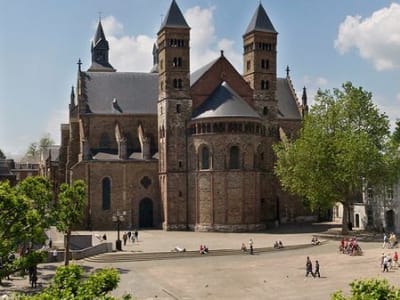 The Romanesque Onze-Lieve-Vrouwebasiliek basilica with twin towers on the Vrijthof square in Maastricht, Netherlands