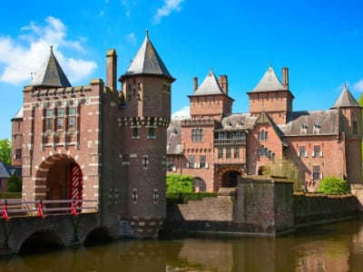 The neo-Gothic Kasteel de Haar fortress with towers and drawbridge over the moat near Utrecht, Netherlands