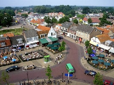 Aerial view of the lively Renesse village centre with shops, terraces and surrounding dune landscape, Zeeland, Netherlands