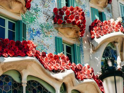 Casa Batlló Barcelona Gaudí facade detail with red roses and colorful ceramic balconies