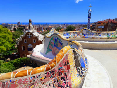 Park Güell Barcelona colorful mosaic bench terrace with Gaudí architecture and city views