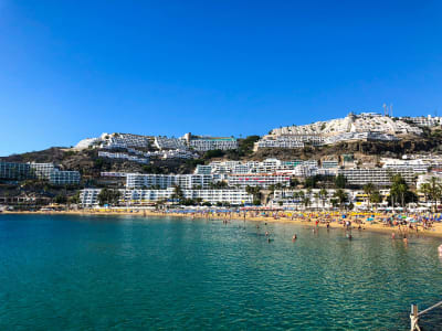 Puerto de Mogán Gran Canaria white hillside village with beach and turquoise harbour Canary Islands