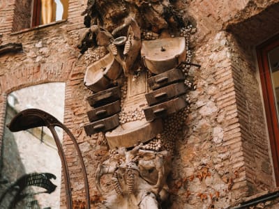 Eclectic wall decoration with bread loaves and sculptural elements at Dalí Museum Figueres Catalonia