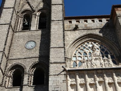 Ávila Cathedral Gothic facade with rose window and stone towers Castile and León Spain