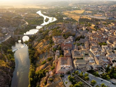 Aerial view of Toledo historic city encircled by Tagus river gorge Castile-La Mancha Spain