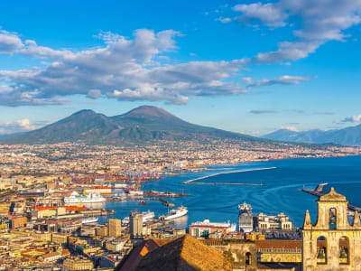 Naples panoramic view with Mount Vesuvius Bay of Naples and church tower Campania Italy