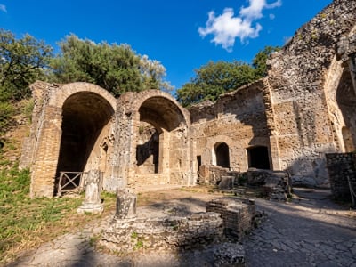Crumbling stone arches and walls of the ancient ruins at Hadrian's Villa UNESCO World Heritage Site, Tivoli