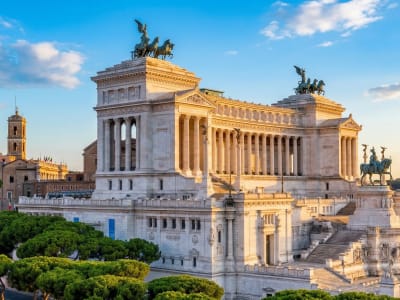 The Vittoriano monument with white marble columns and equestrian statue on Piazza Venezia in Rome