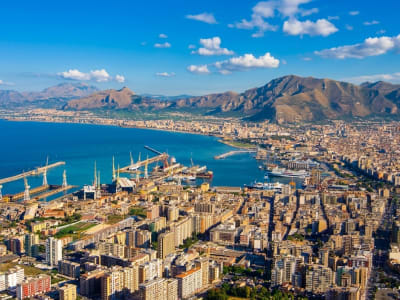 Aerial view of Palermo with the harbour, Monte Pellegrino and the city stretching to the sea in Sicily