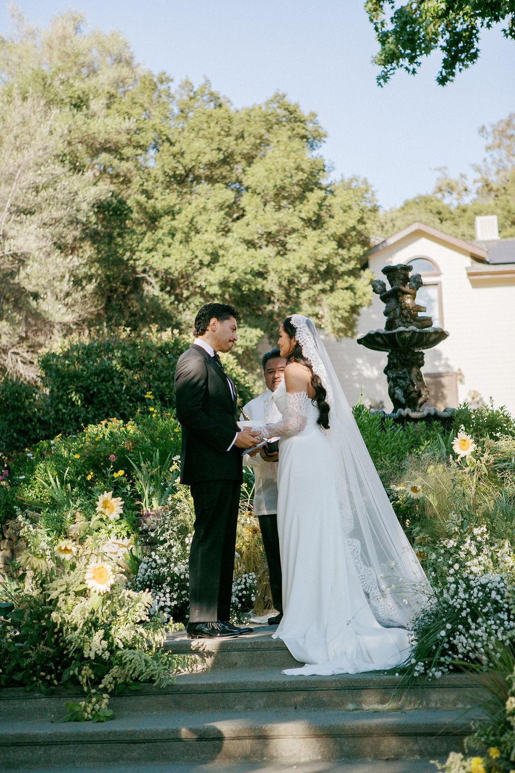 Briana & Nicolas ceremony at the garden fountain