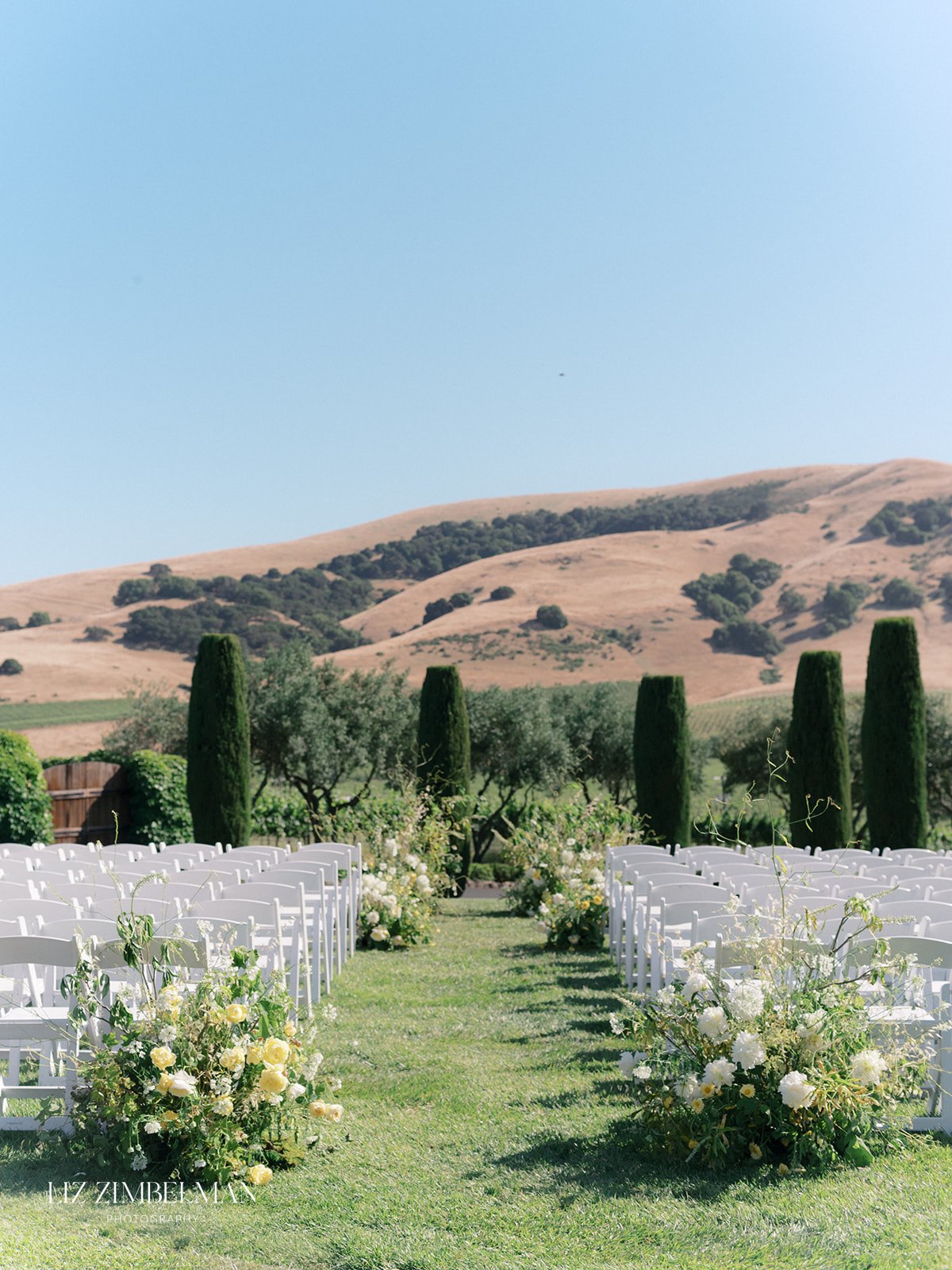 Alice & Paul ceremony aisle florals at Viansa Winery