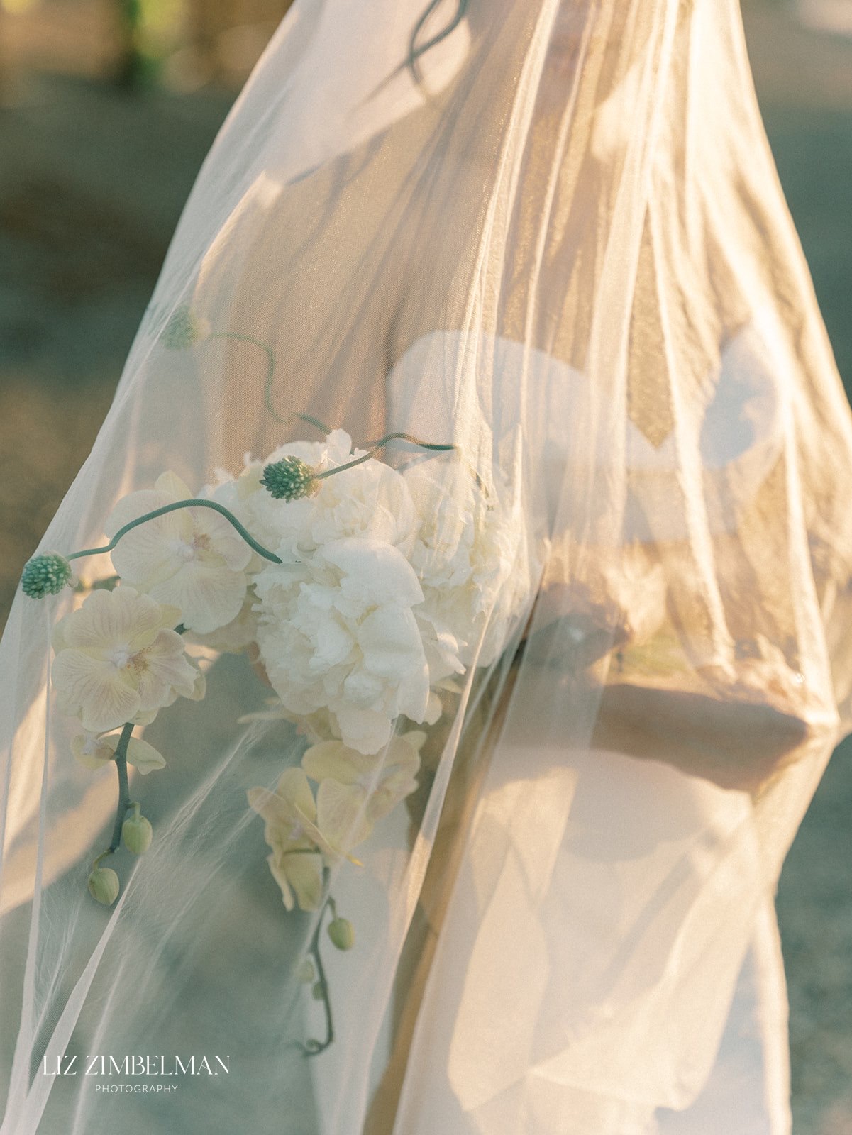 Bridal bouquet through veil
