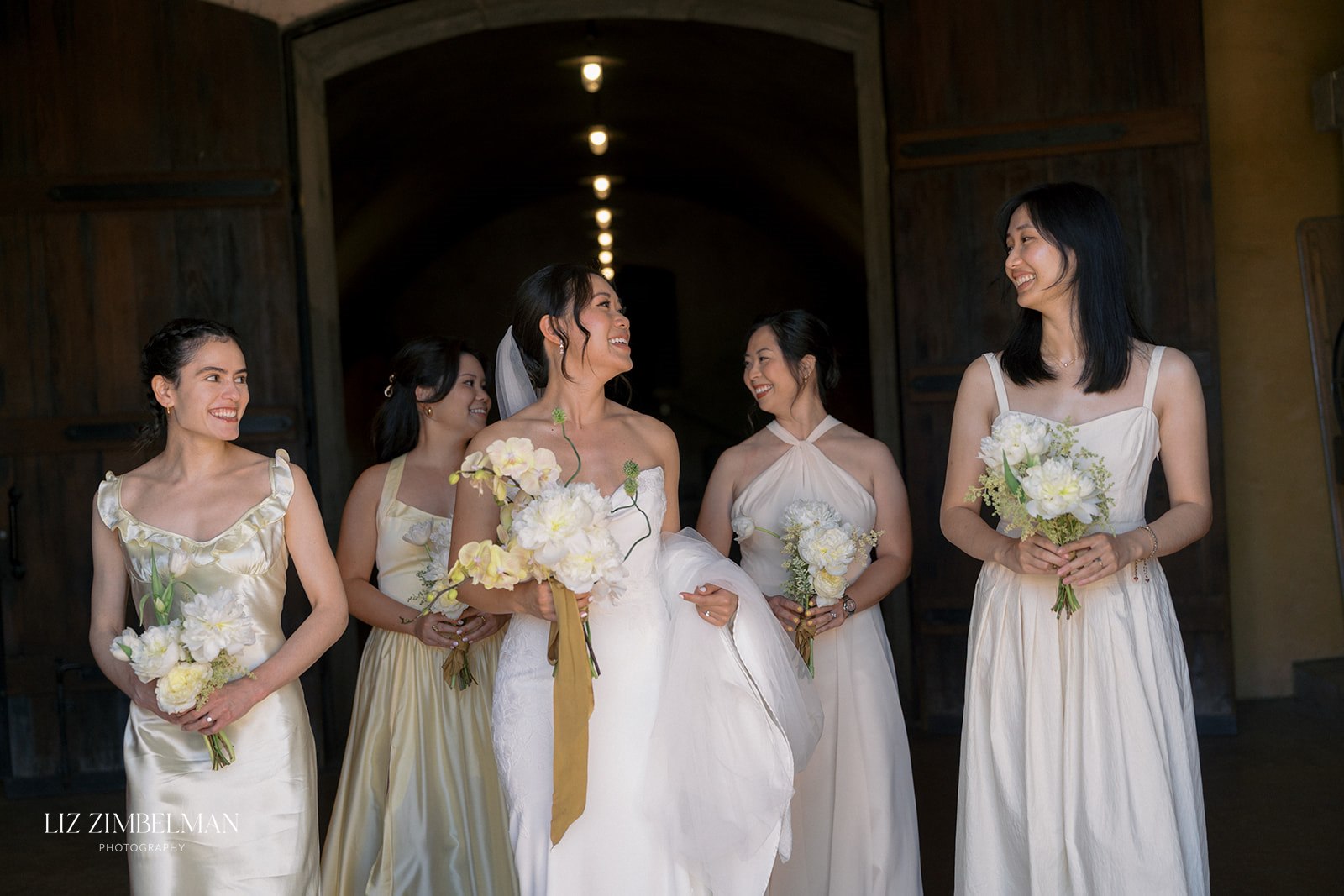 Bride and bridesmaids with bouquets