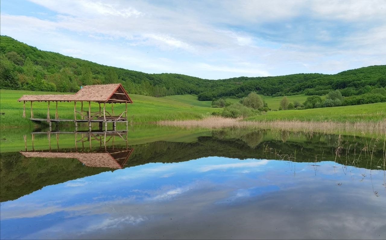 Lakeside stop during a village birthday walk at Two Boots Ranch
