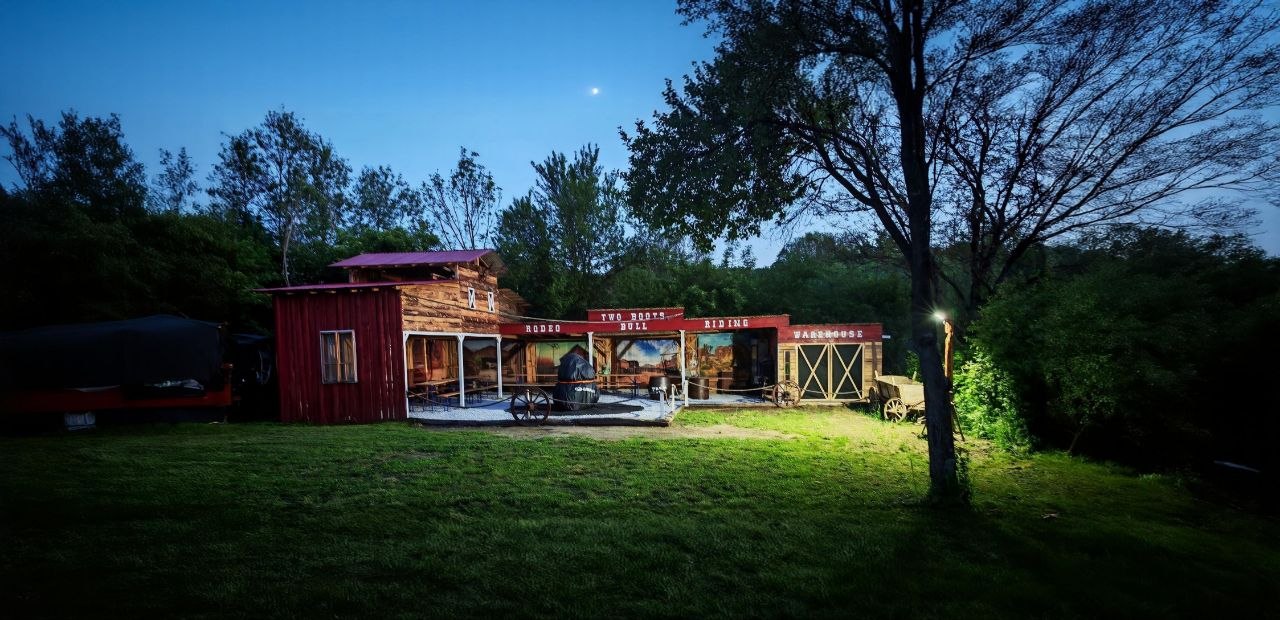 Two Boots Ranch lit up in the evening after the company sports day