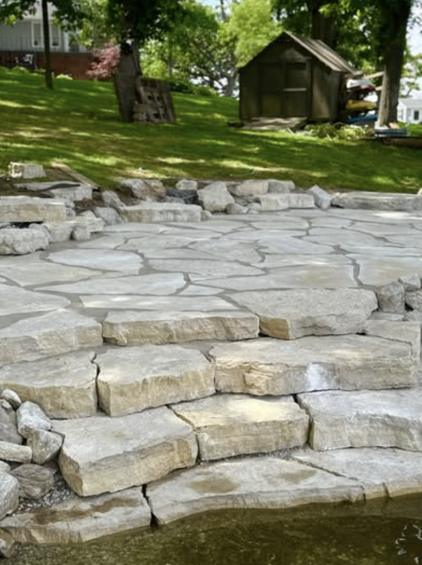 Vertical-RockStairsIntoLake_qxjszz