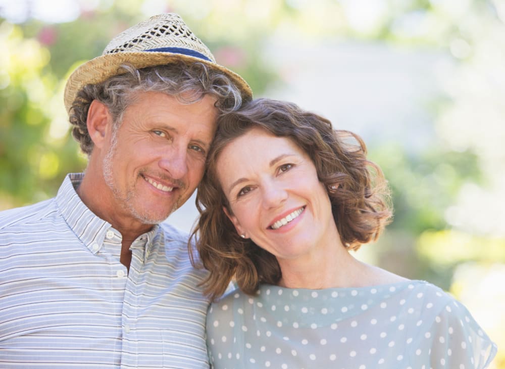 A couple in their 50s enjoying their home