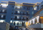 Delight Hotel and Suites - Background image