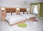 Delight Hotel and Suites - Background image
